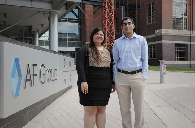 Jazmine Mercado, University of Michigan (left), and Syed Umair, University of Illinois at Champaign-Urbana (right), at AF Group headquarters in Lansing, Mich.